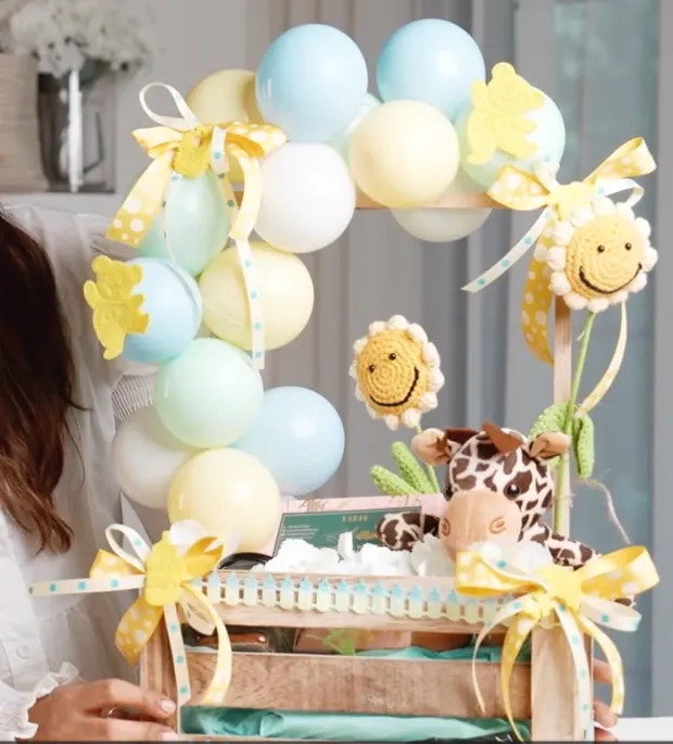 A grand crate hamper with a balloon arch